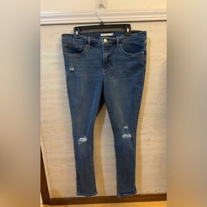 Levi's 311 Shaping Skinny Distressed Jeans.